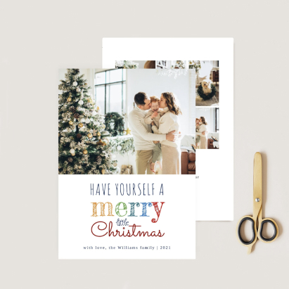 Personalized Christmas card with photo in a Christmas scenery.