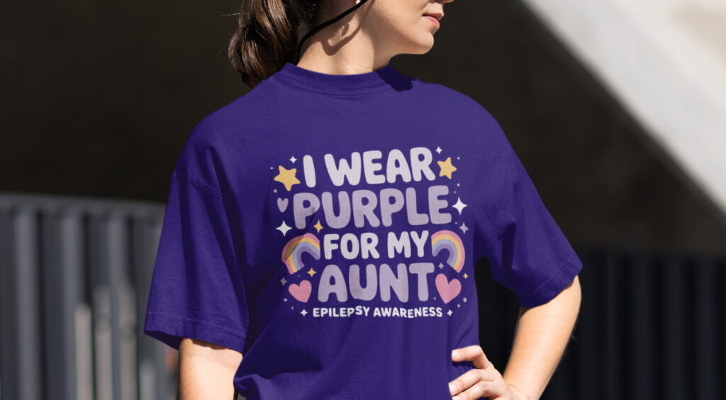A person wearing a purple shirt with the text "I wear purple for my aunt" displayed prominently.