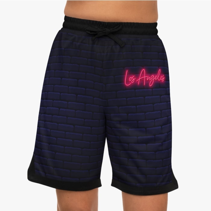 An example image of custom basketball shorts with lettering.