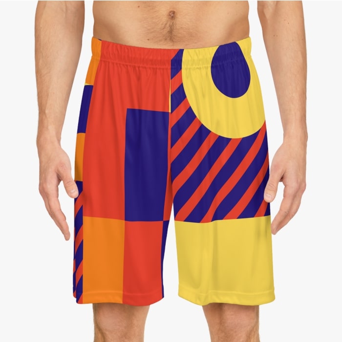 An example image of custom basketball shorts with abstract graphics.