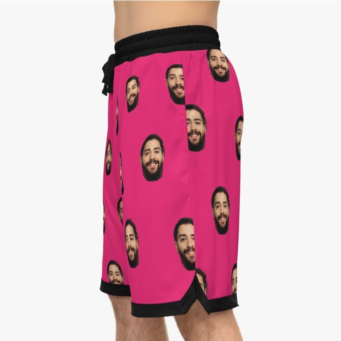 An example image of custom basketball shorts with picture elements on them.