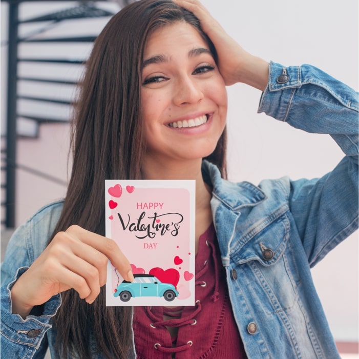 A Woman Holding a Happy Valentine’s Day Greeting Card
