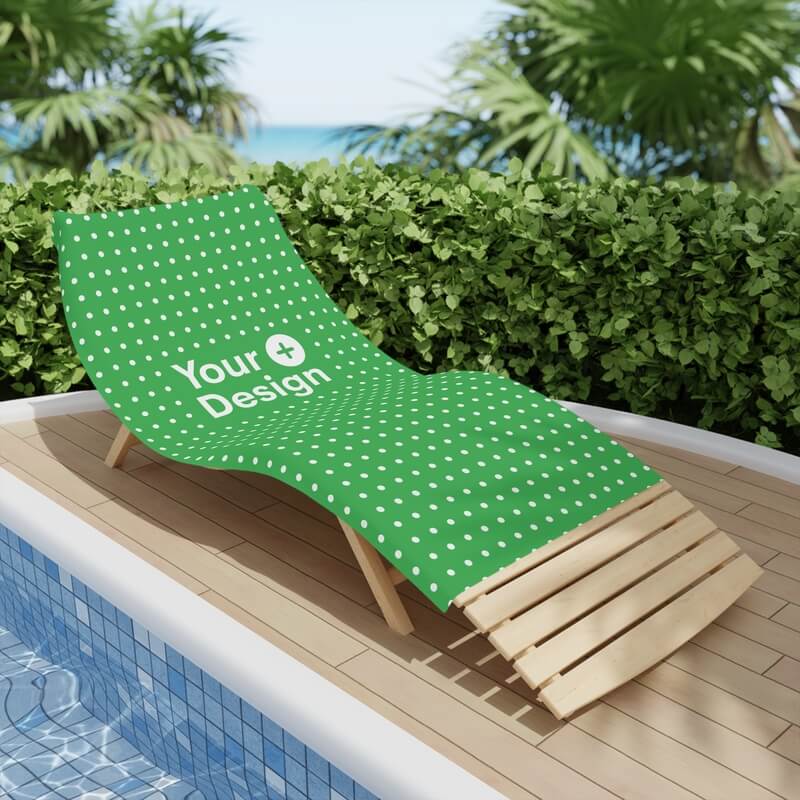 Beach towel with a “Your Design Here” sign on a beach chair next to a pool.