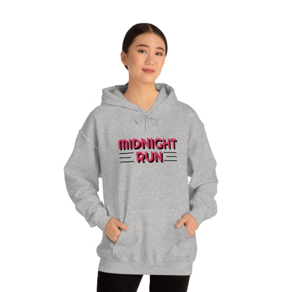 A light gray sweatshirt with the words “Midnight Run” printed on in pink letters.