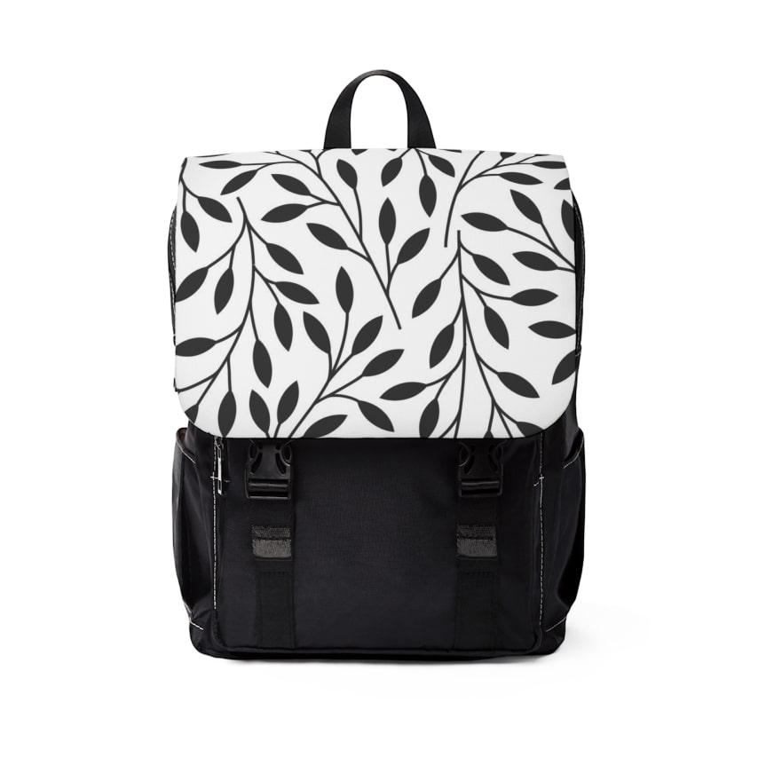 A black and white backpack with leaves print on the lid.