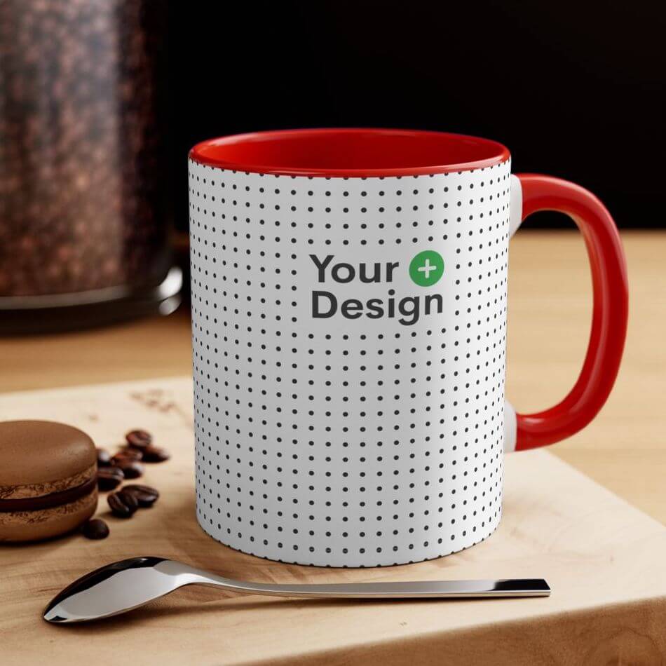A mockup photo of a red accent mug with a placeholder for your design.