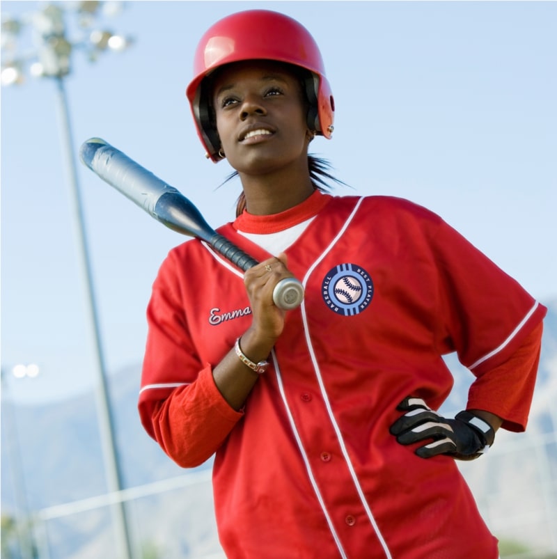 An image of a woman baseball player wearing a custom baseball jersey.
