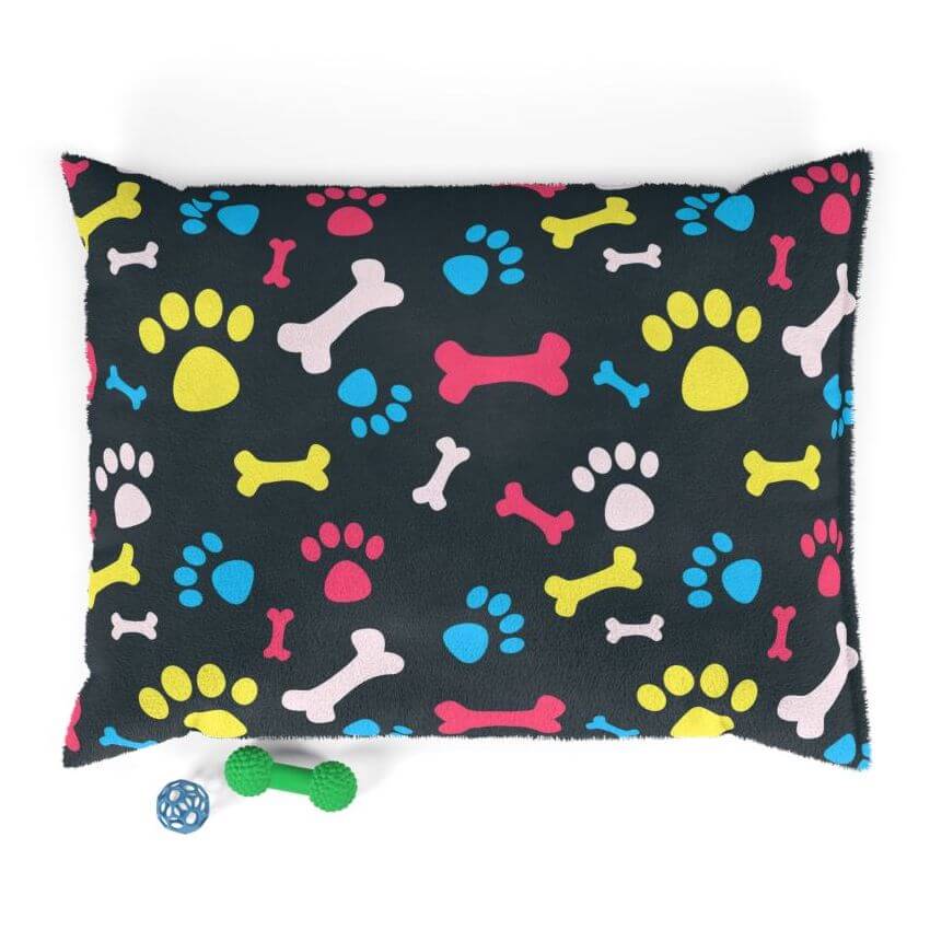 Custom pet pillow with a colorful bone pattern in all-over-print