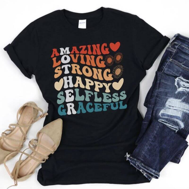 Displayed outfit with a black t-shirt that has a creative wordplay reading the word Mother from top to bottom
