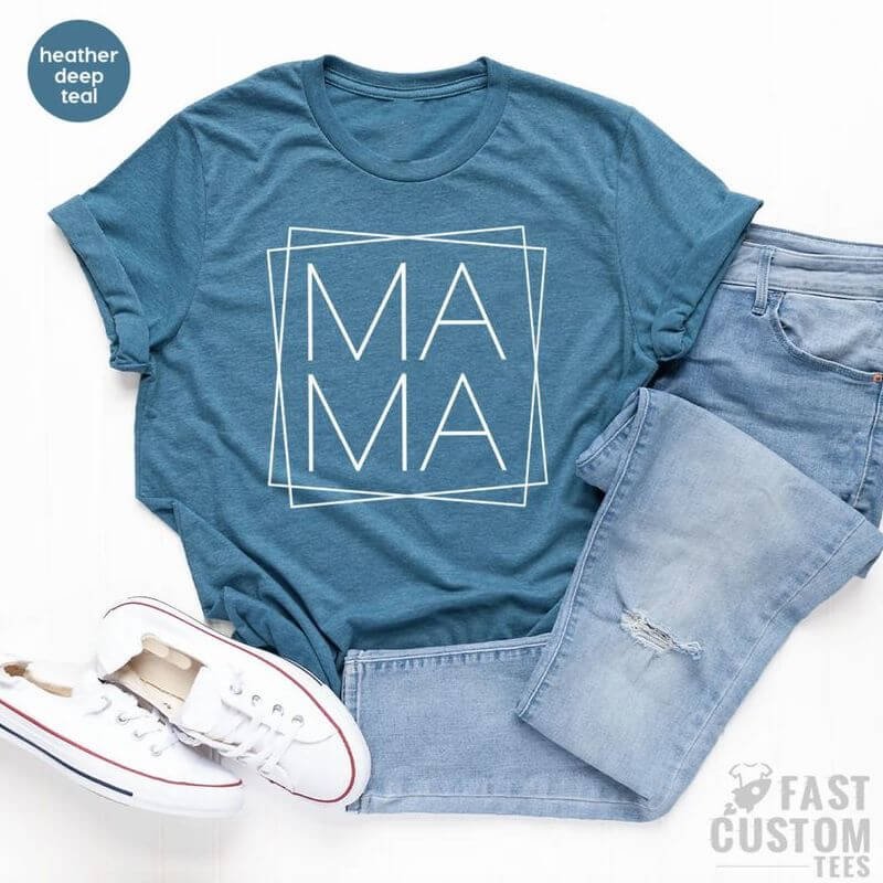Displayed outfit with jeans, sneakers, and a custom t-shirt with a simple "Ma-Ma" design