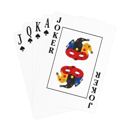 A set of poker cards with the Joker card on top.