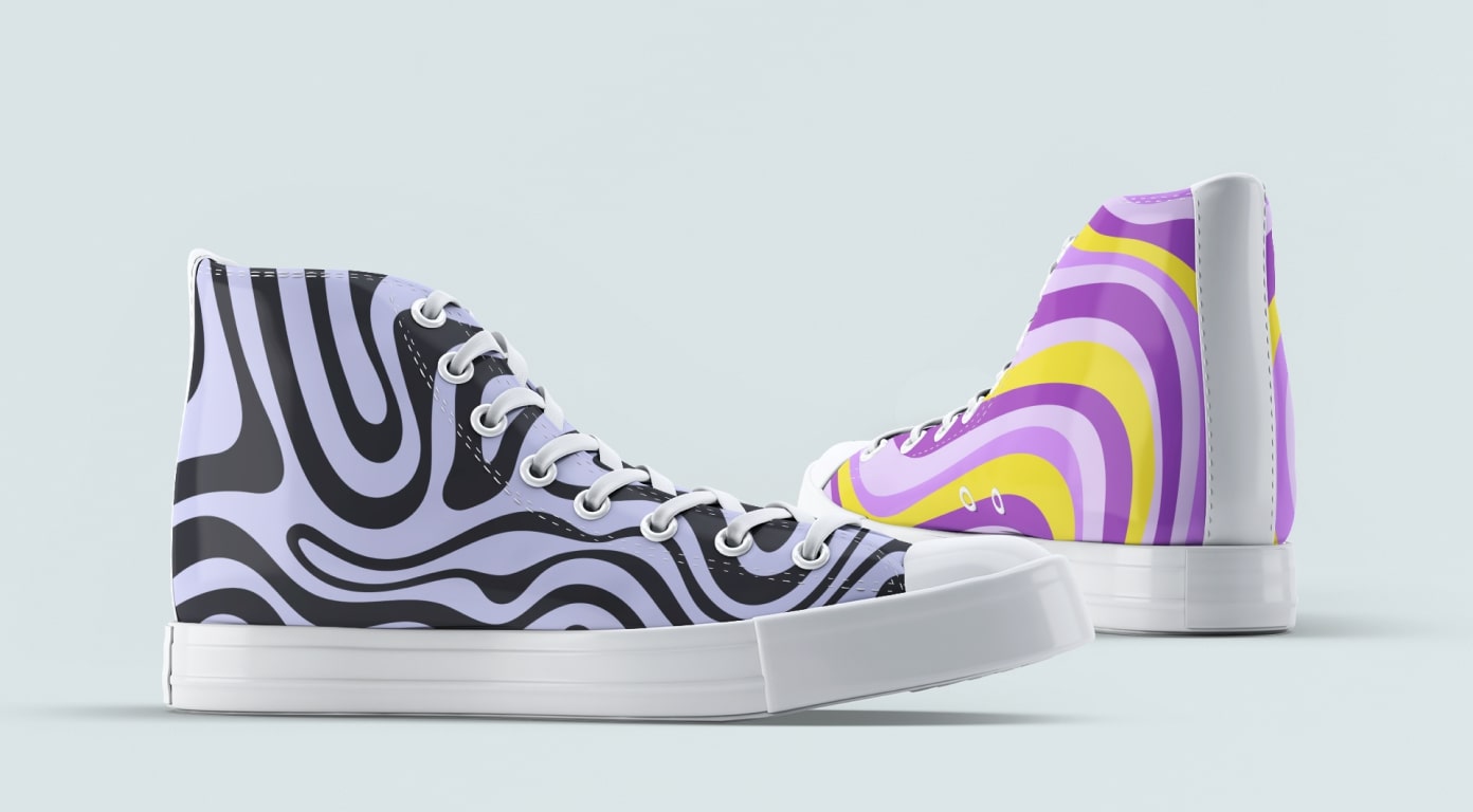 An image with a pair of custom high top sneakers with an abstract illustration design.