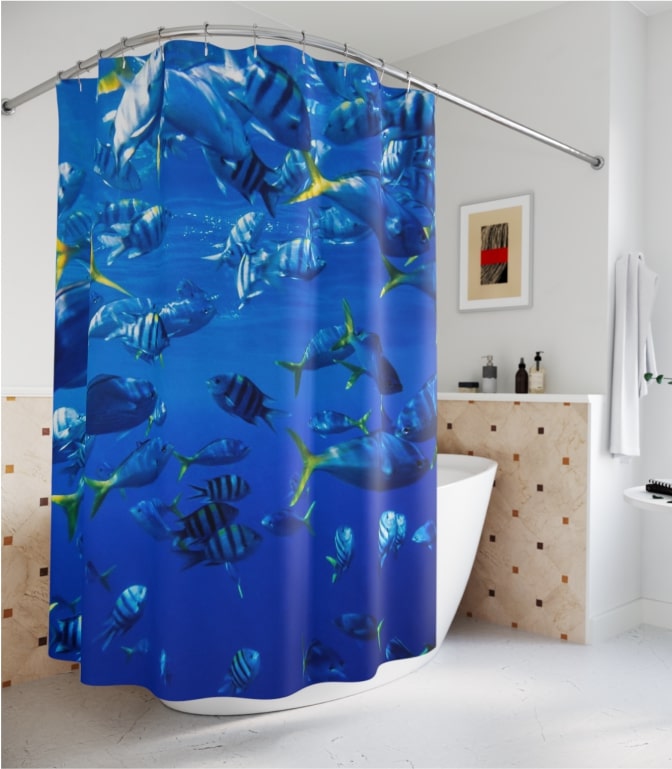 An image of a custom shower curtain with an ocean themed design.