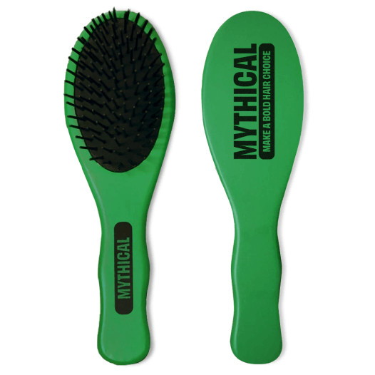 A green hairbrush with the text “Mythical: make a bold hair choice” printed on the back.