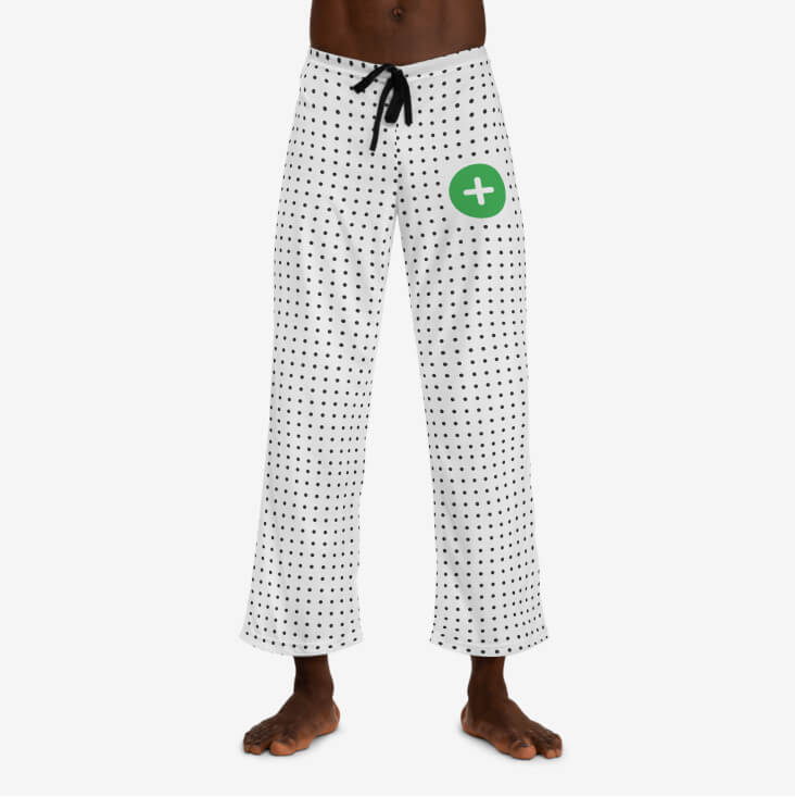 All-over-print men's pajama pants with the “Your design here” sign.
