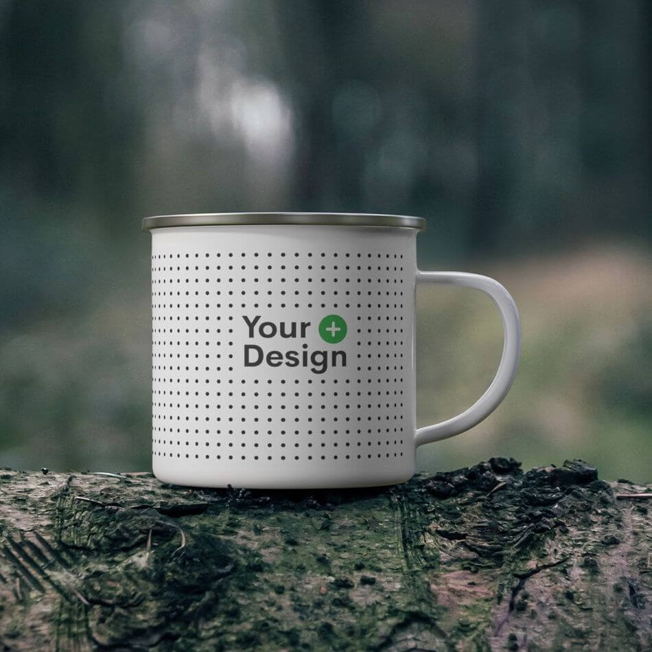 A mockup photo of a blank, white enamel mug with a placeholder for your custom design.
