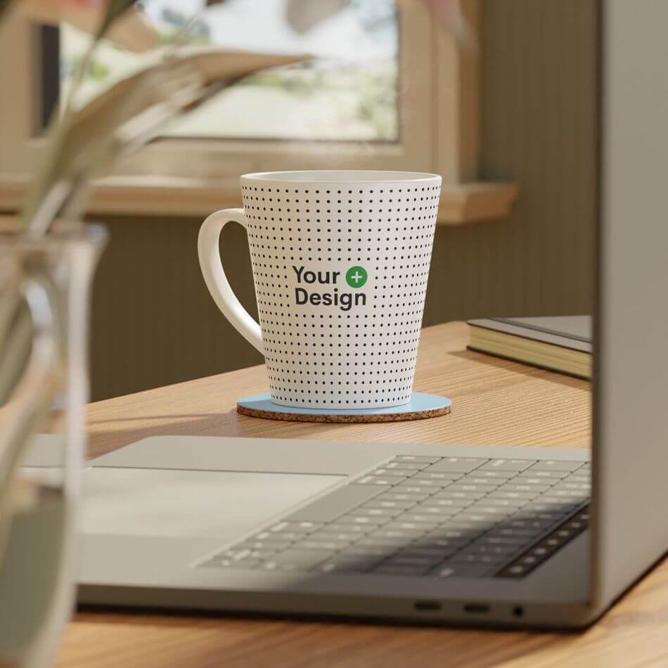 A mockup photo of a blank, white latte mug with a placeholder for your custom design.