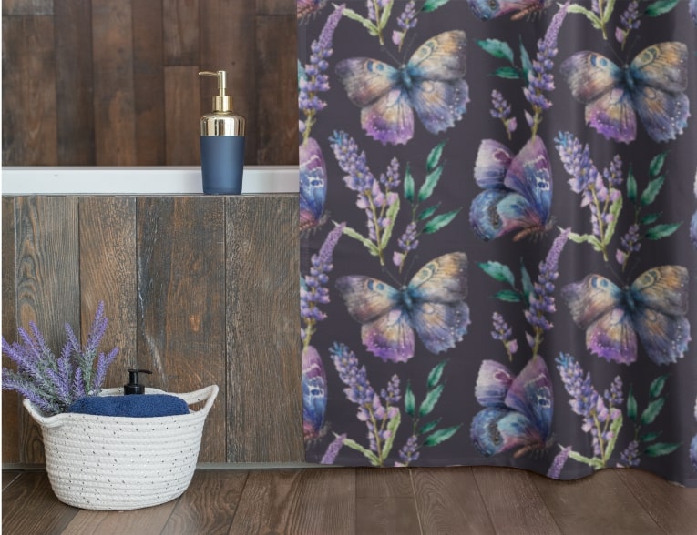 An image of a custom shower curtain with a flora and fauna design.