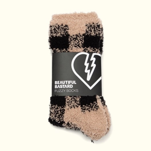 Beautiful Bastard brand fuzzy socks with a brown and black pattern.