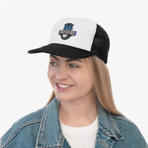 A woman wearing a custom trucker hat with a team logo.