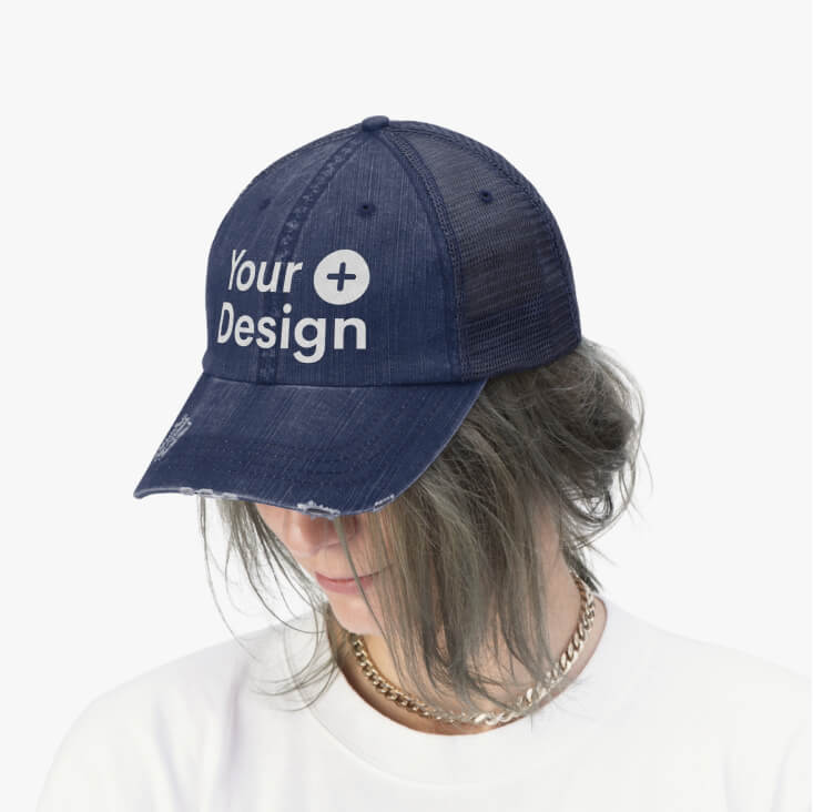 A mockup with a woman wearing a blue jeans trucket hat.