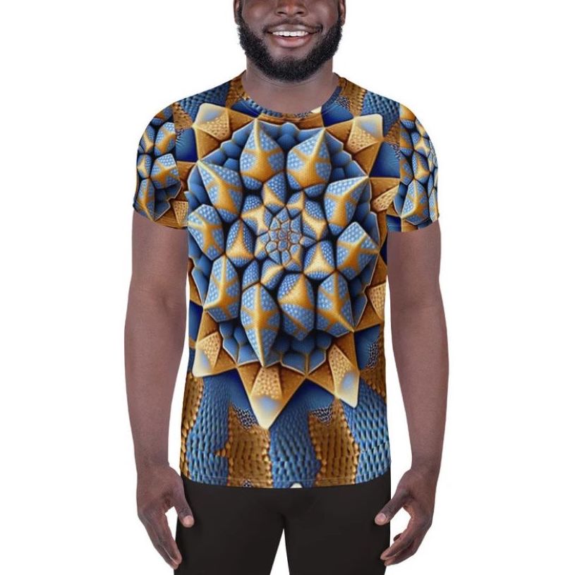 Man wearing an all-over printed t-shirt with an abstract vector pattern in various blue and gold shades.