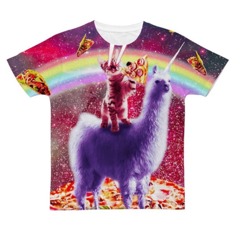 A t-shirt printed from edge to edge with a picture of a kitten shooting lasers from his eyes, holding a slice of pizza, riding a purple unicorn llama; the background is a giant pizza on a galactic background, flying pizza slices and a rainbow.
