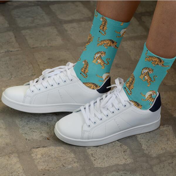An image of custom socks with a leopard pattern.