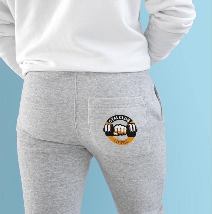 An image of custom sweatpants with a logo on the back side.