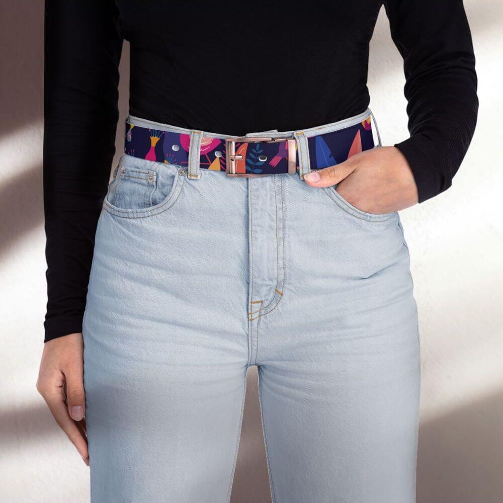 Woman wearing a personalized belt with a colorful geometric pattern.