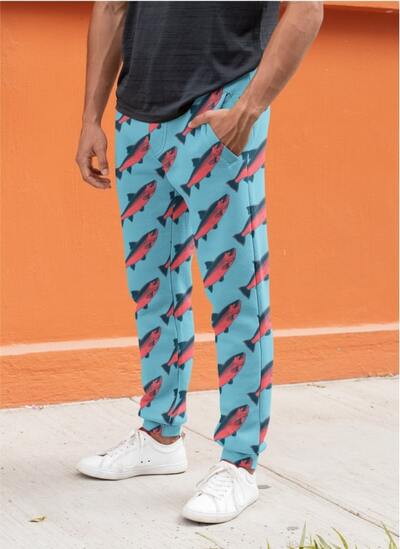 An image of a man wearing custom sweatpants with an abstract illustration.