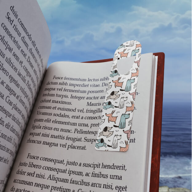 An open book with a bookmark customized with a dog pattern