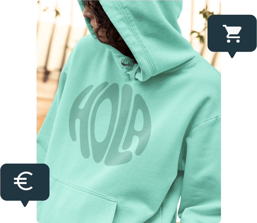A woman wearing a mint green hoodie that says “Hola”