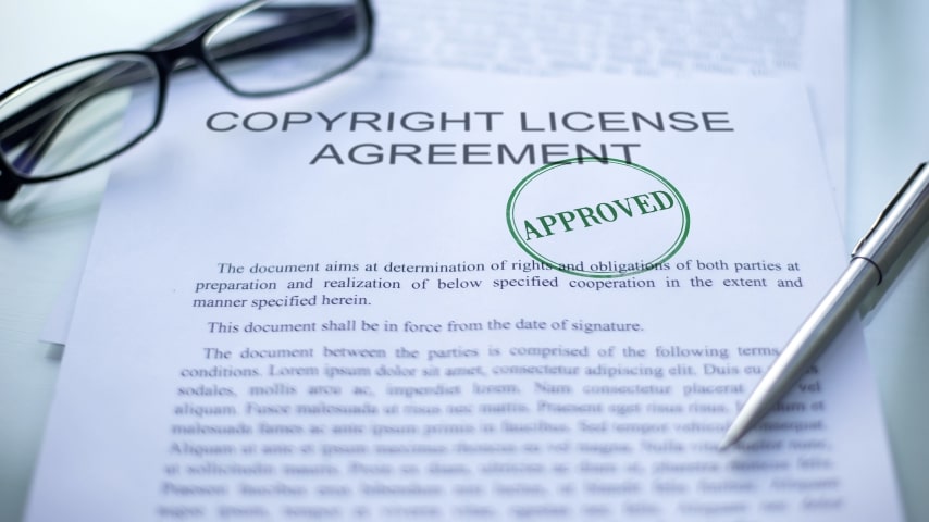 Copyright License Agreement with a stamp of approval on it.