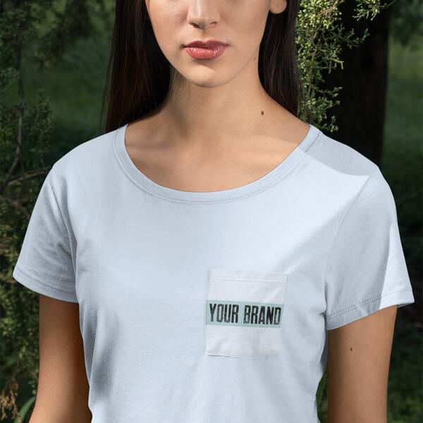 Woman wearing a light blue shirt with a “Your Brand” logo placeholder on the left front pocket.