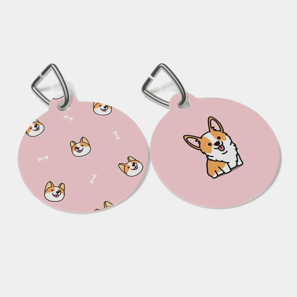 Two round custom pet tags in pink, adorned in adorable corgi illustrations