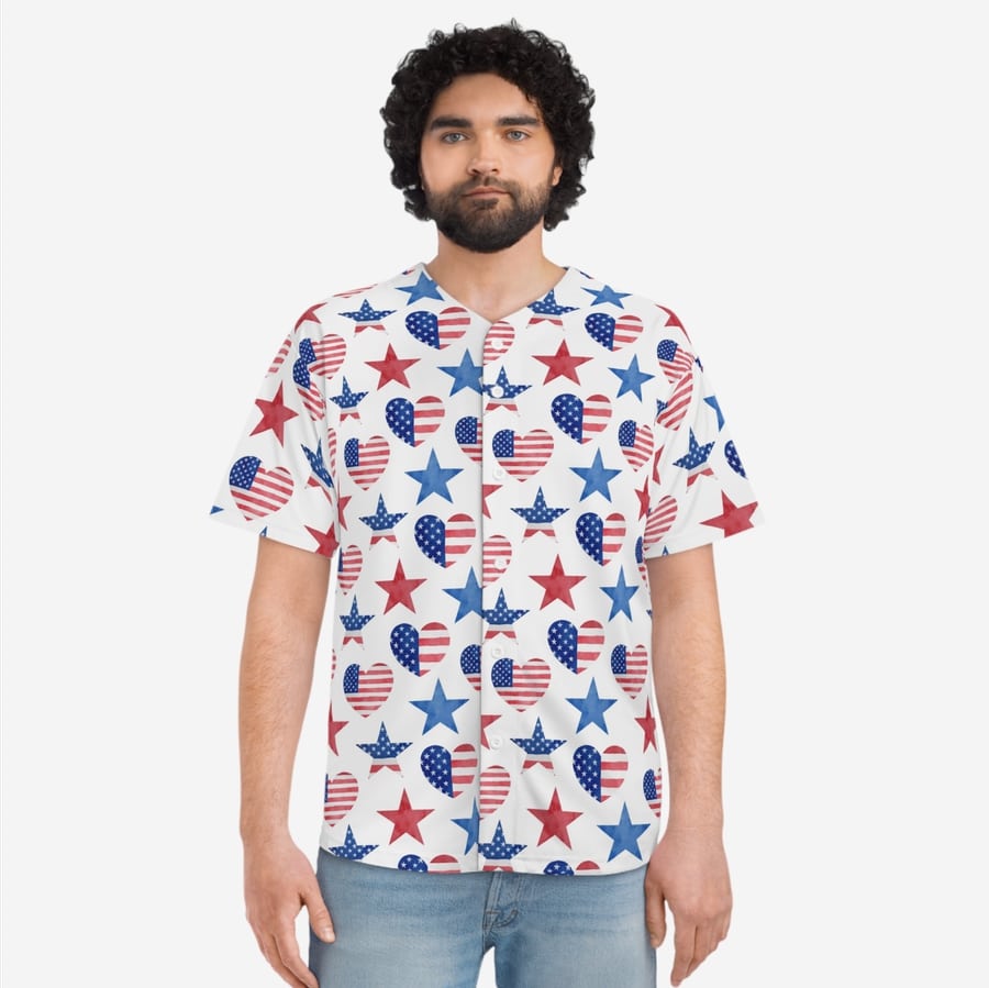 Model posing in an all-over-print button-up shirt printed with American flag heart patterns and color coded stars.
