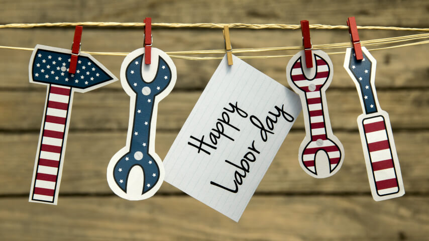 Four clothespin-affixed kiss-cut stickers with American themes and "Happy Labor day" printed on one, hanging from a string.