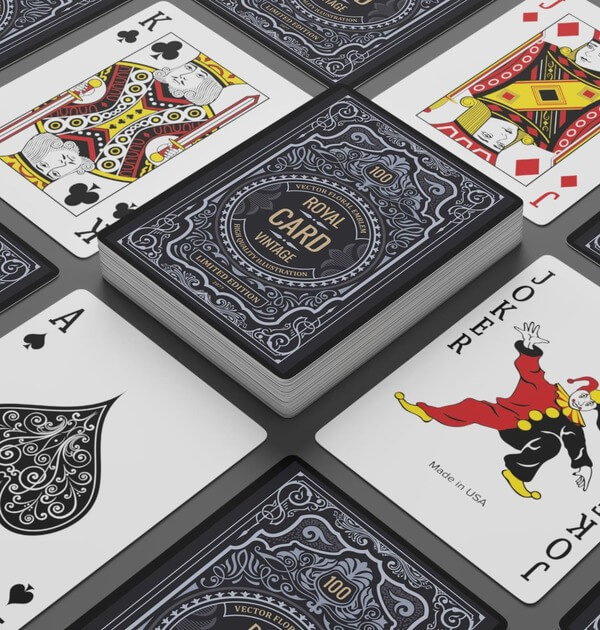 Spread-out deck of playing cards with a custom print of a retro vintage card set.