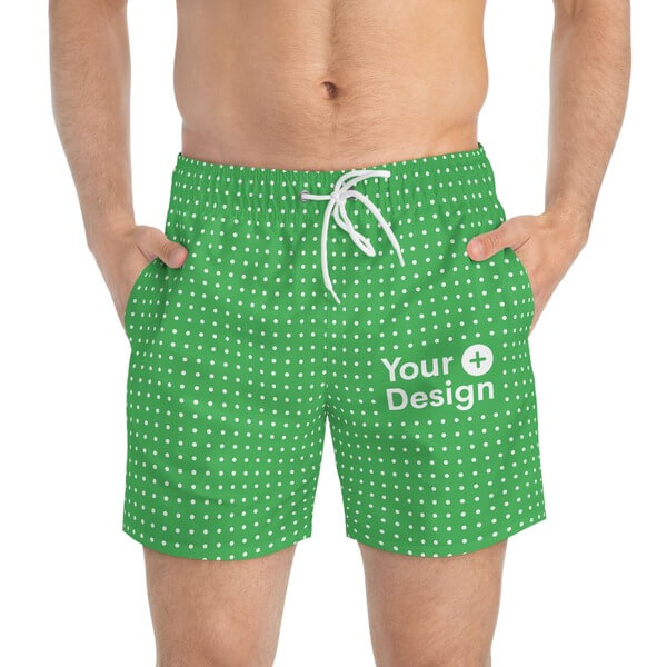 Blank mockup of men's AOP swim trunks and the “Your Design Here” placeholder.