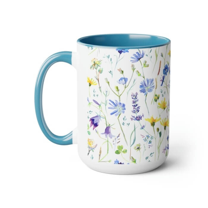 Blue accent mug with a pattern of blue, purple, and yellow flowers.