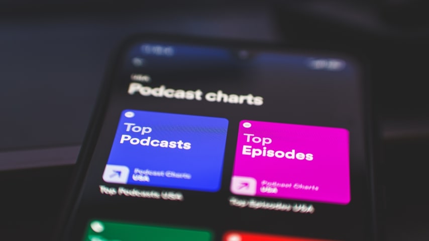 Spotify's Podcast Charts section showing Top Podcasts and Top Episodes.