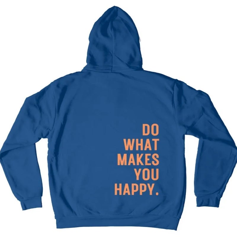 Back of a blue hoodie with text on the right side in large orange letters, saying “Do what makes you happy.”
