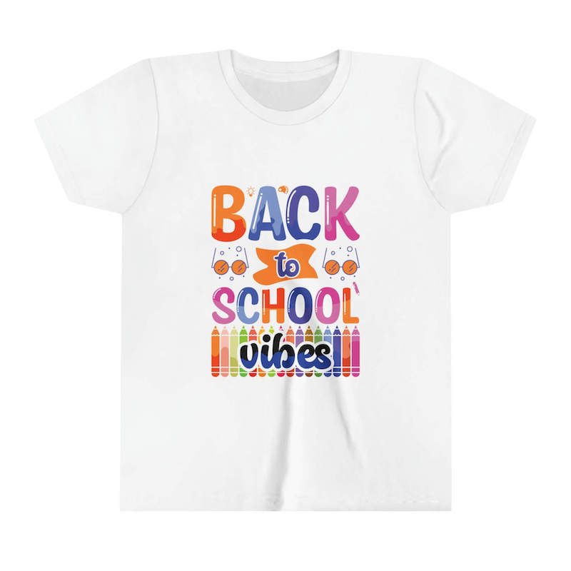 A white youth t-shirt with a colorful custom design that says "Back to School Vibes".