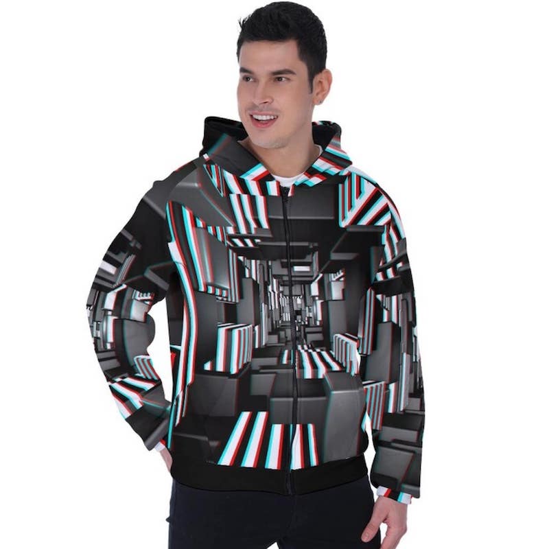Man wearing an all-over-print hoodie with a design of a black and white optical 3D depth illusion.