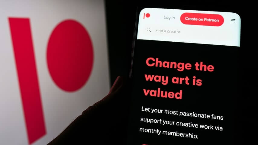 A phone screen with the Patreon logo and the text: “Change the way art is valued.”