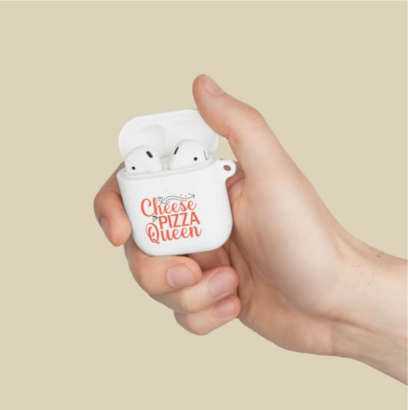 A hand holding a personalized AirPod case that says: "Cheese pizza Queen".