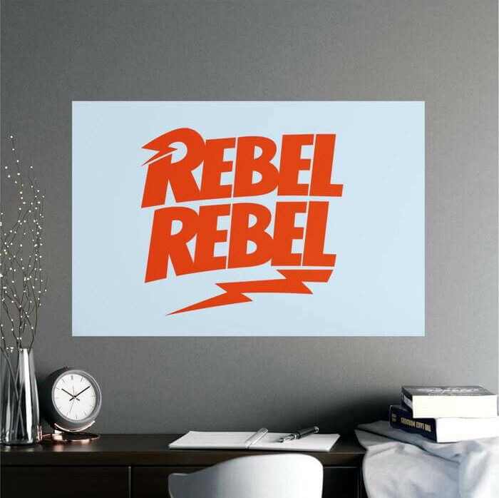 Horizontal poster with the words “Rebel Rebel” in red on a light blue background and with lightning elements around.