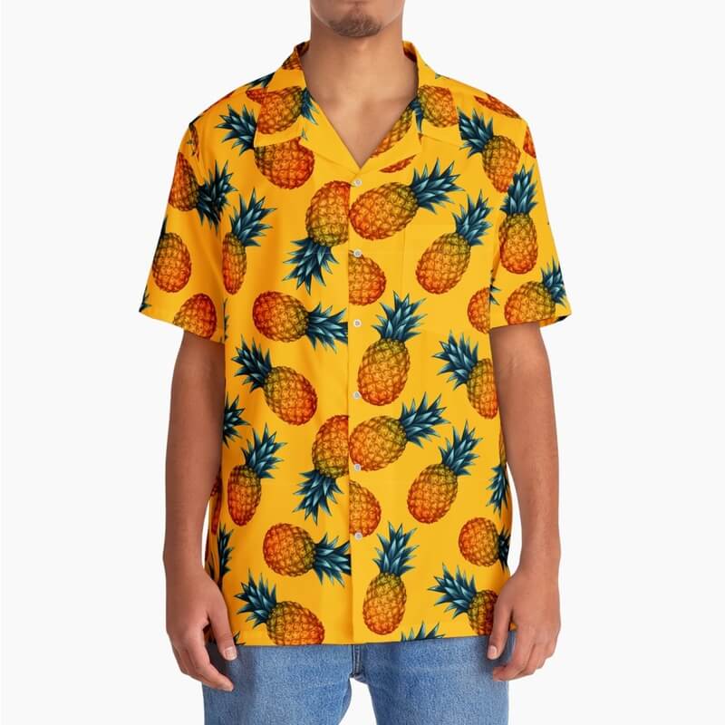 A mockup image of a men's custom all-over-print Hawaiian shirt with a pinapple print.