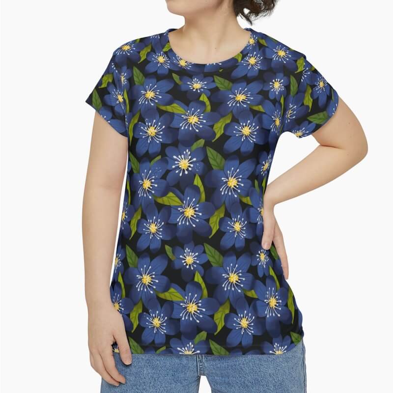 A mockup image of a woman wearing a custom short sleeve t-shirt with a floral print.